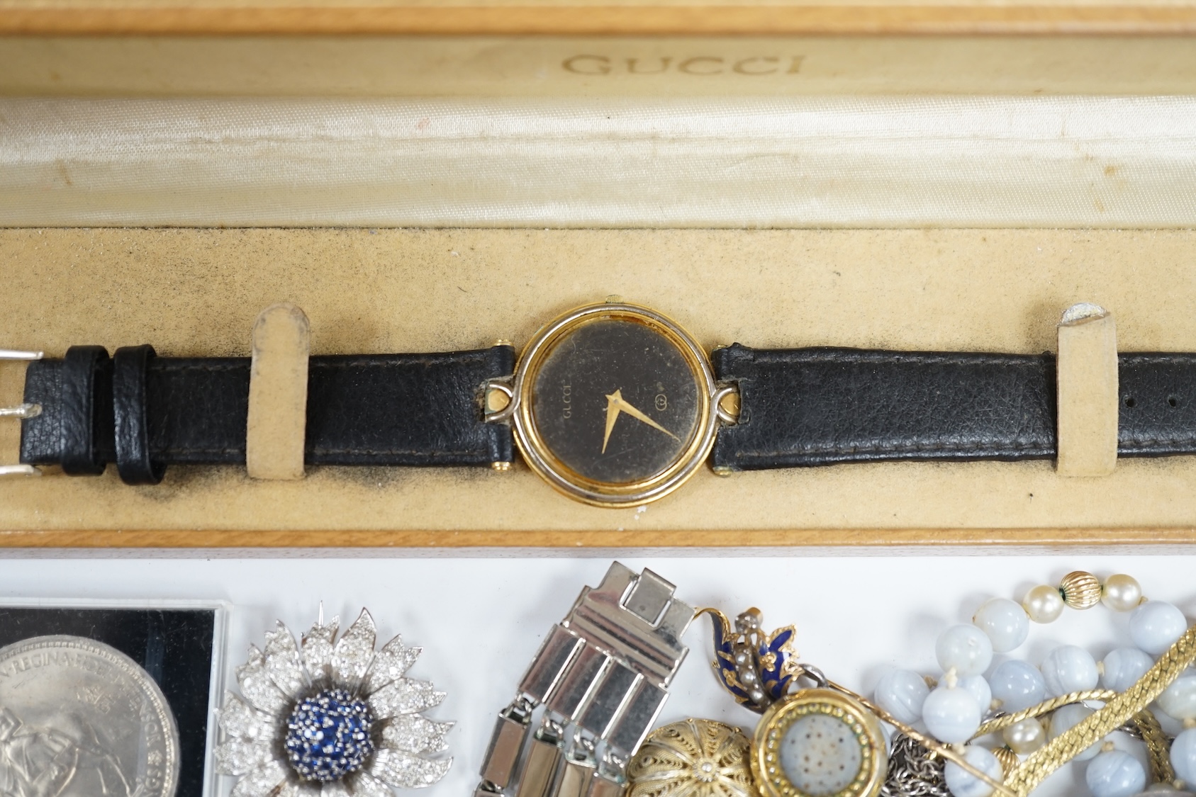 Sundry jewellery and watches, including a late Victorian silver oval locket, an agate bead necklace, Gucci watch silver brooch, enamel diamond and seed pearl set pin, etc. Condition - poor to fair